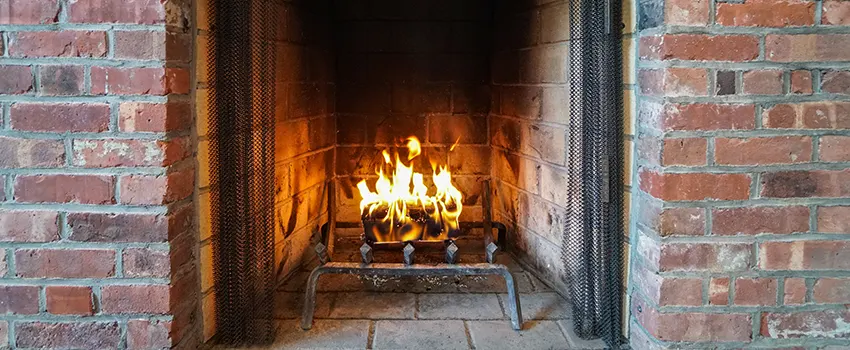 Repairing Damaged Fireplace Tiles in Winchester, Massachusetts